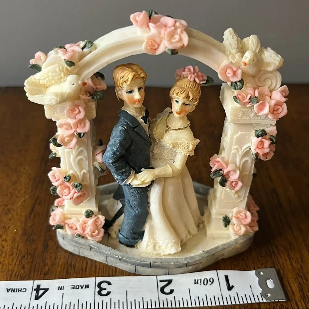 Vintage wedding cake topper. Romantic Wedding Couple Figurine with Pink Roses
